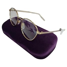 Gucci Gafas redondas pequeñas de montura metálica oro y beige