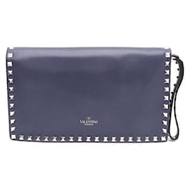 Valentino Clutch Rockstud con patta dorata