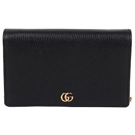 Gucci Bolso bandolera WOC GG Marmont en tono dorado y negro