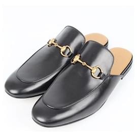 Gucci Mule in pelle con morsetto nero