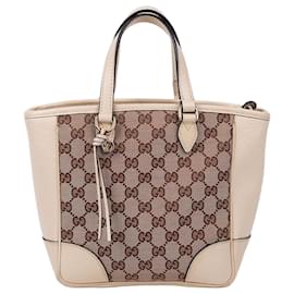 Gucci Piccola borsa a tracolla con zip in tessuto GG bianco
