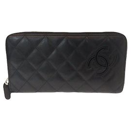 Chanel Cartera larga con cremallera de piel de cordero negra Serie