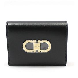 Salvatore Ferragamo Cartera compacta Gancini bañada en oro negro - Sin usar
