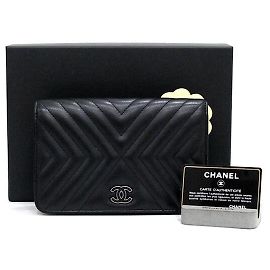 Chanel Bolsa de ombro WOC em couro de vitelo preto chevron com tassel e corrente prateada