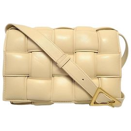 Bottega Veneta Borsa Cassette imbottita con intreccio in oro