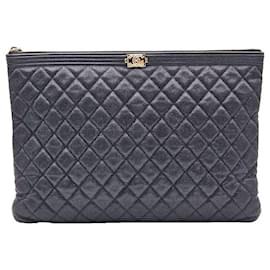 Clutch Boy Large in Metallo Oro Champagne Black Caviar - Chanel