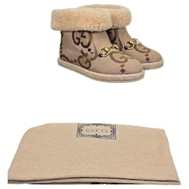 Gucci Botines de caña corta en lona Jumbo GG y shearling con mors
