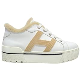 Sneakers Abantaus in shearling con logo bianco - Hermès