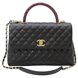 Borsa a tracolla Coco Handle Large in lucertola nera Black Caviar - Chanel