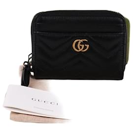 Gucci Tarjetero matelassé GG con baño de oro