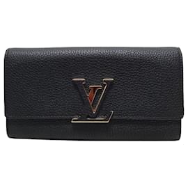 Langer Capucines Portemonnaie aus schwarzem Taurillon Leder Gold LV - Louis Vuitton