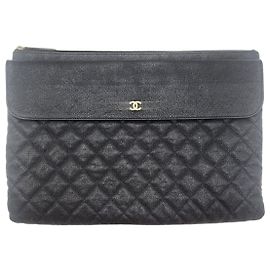 Chanel Clutch con patta serie Caviar