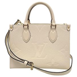 Louis Vuitton Empreinte OnTheGo Beige Cream