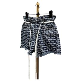 Balenciaga Pantalones cortos de denim con logotipo impreso Miu Miu