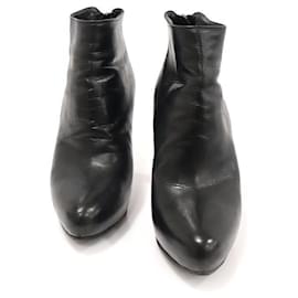Botines con cremallera en cuero negro para mujer - Prada