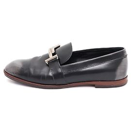 Tod's Mocassino in pelle nero e argento con doppio logo da donna