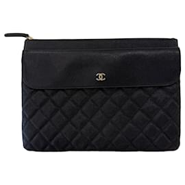 Chanel Clutch con patta Caviar