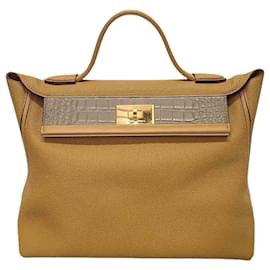 Hermès Kelly Tasche aus Alligator Togo Swift Gold Karamell