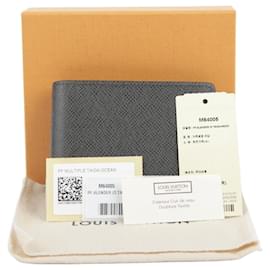 Louis Vuitton Cartera delgada de cuero Taiga