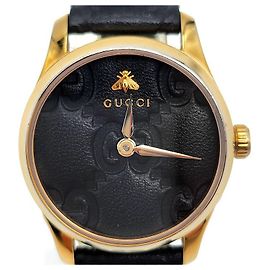 Gucci Zeitlose goldbeschichtete Uhr