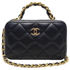 Chanel Mini borsa porta cosmetici in pelle di agnello nera con manico superiore e catena dorata con chip