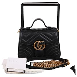 Gucci Mini bolso de mano GG Marmont con cadena