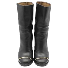Mid Boots aus schwarzem Leder mit goldfarbenem CC-Logo - Chanel