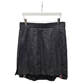 Minifalda plisada de sarga de lana gris - Thom Browne