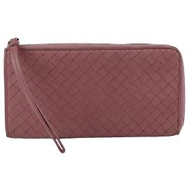 Bottega Veneta Cartera larga de cuero Intrecciato rosa oscuro
