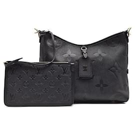 Louis Vuitton Carryall PM in tela Monogram