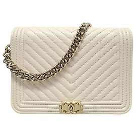 Chanel Mini borsa a tracolla WOC Chevron in Caviar bianco e Oro Champagne