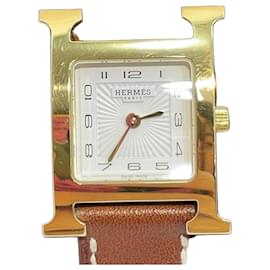 Damenuhr mit doppeltem Lederarmband und Goldbeschichtung - Hermès