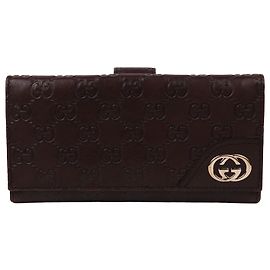 Gucci Portafoglio Long Signature GG in Metallo Oro Marrone Scuro
