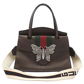 Gucci Borsa a mano e a spalla in pelle marrone con totem a farfalla di cristallo