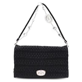 Clutch e borsa a tracolla in nappa trapuntata con catena di cristalli - Miu Miu