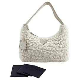 Mini borsa hobo in shearling con logo a triangolo - Prada