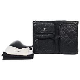 Chanel Clutch in pelle caviar con tasche multiple