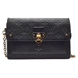 Louis Vuitton Portafoglio con catena in tela Monogram