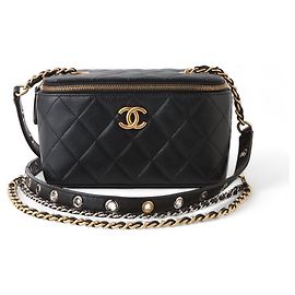 Chanel Borsa trucco vanity crossbody con tracolla a catena CC color oro in pelle di agnello