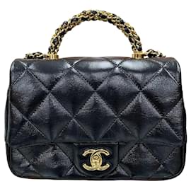Chanel Mini Flap Bag con catena dorata