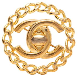 Spilla Chanel Gold CC placcata oro con chiusura Turnlock e catena