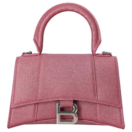 Borsa Hourglass XS di Balenciaga in glitter rosa