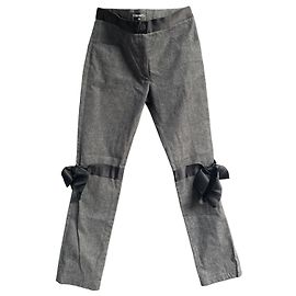 Pantalones Chanel de lana gris con lazos de satén negro