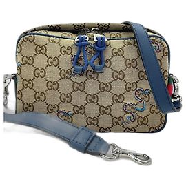 Gucci Schultertasche mit Schlangenstickerei braun