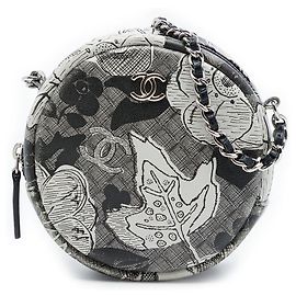 Clutch rotonda Chanel Black CC in pelle di vitello floreale con catena