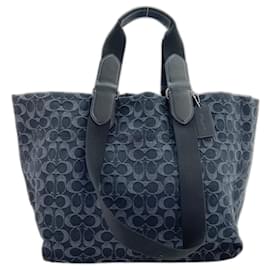 Borsa Boston Small Tour Signature di Coach in denim nero