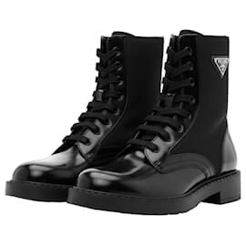 Botas con cordones de cuero y nylon Prada Monolith Negro