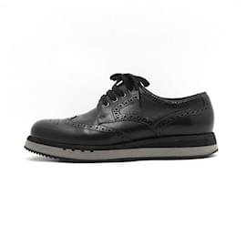 Baskets Air Clipper en cuir noir à bouts perforés pour hommes - Prada