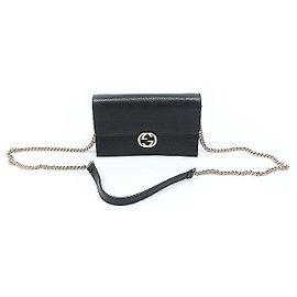 Gucci Borsa a tracolla WOC in pelle nera con GG intrecciato e catena color oro