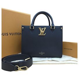 Louis Vuitton Borsa a tracolla Lockandgo Lockme Tote in pelle di vitello granulata nera